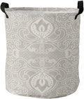 Un panier a linge integre une structure pliante