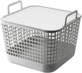 Ce panier a linge dispose d'une poignee de prise en main et d'un couvercle