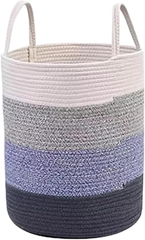 Un panier a linge comprend une partie textile en coton avec une poignee de prise en main